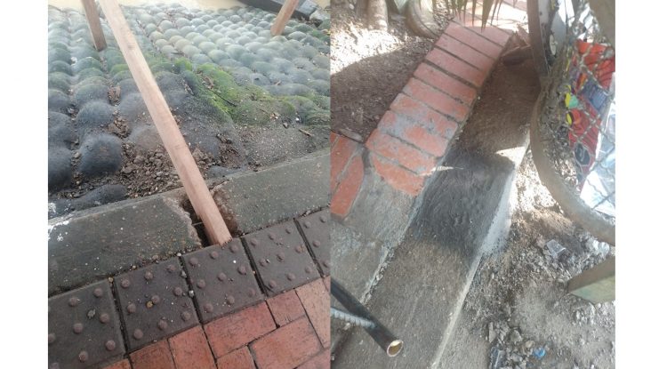 Comerciante reparó daño causado a viga de concreto de muro de contención